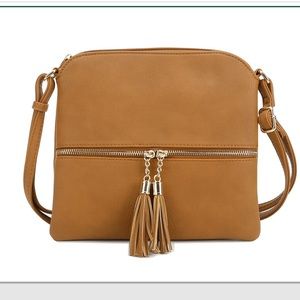 NWT Deluxity LA mustard crossbody with tassels.